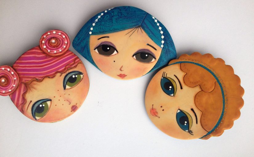 Polymer clay girl face brooch